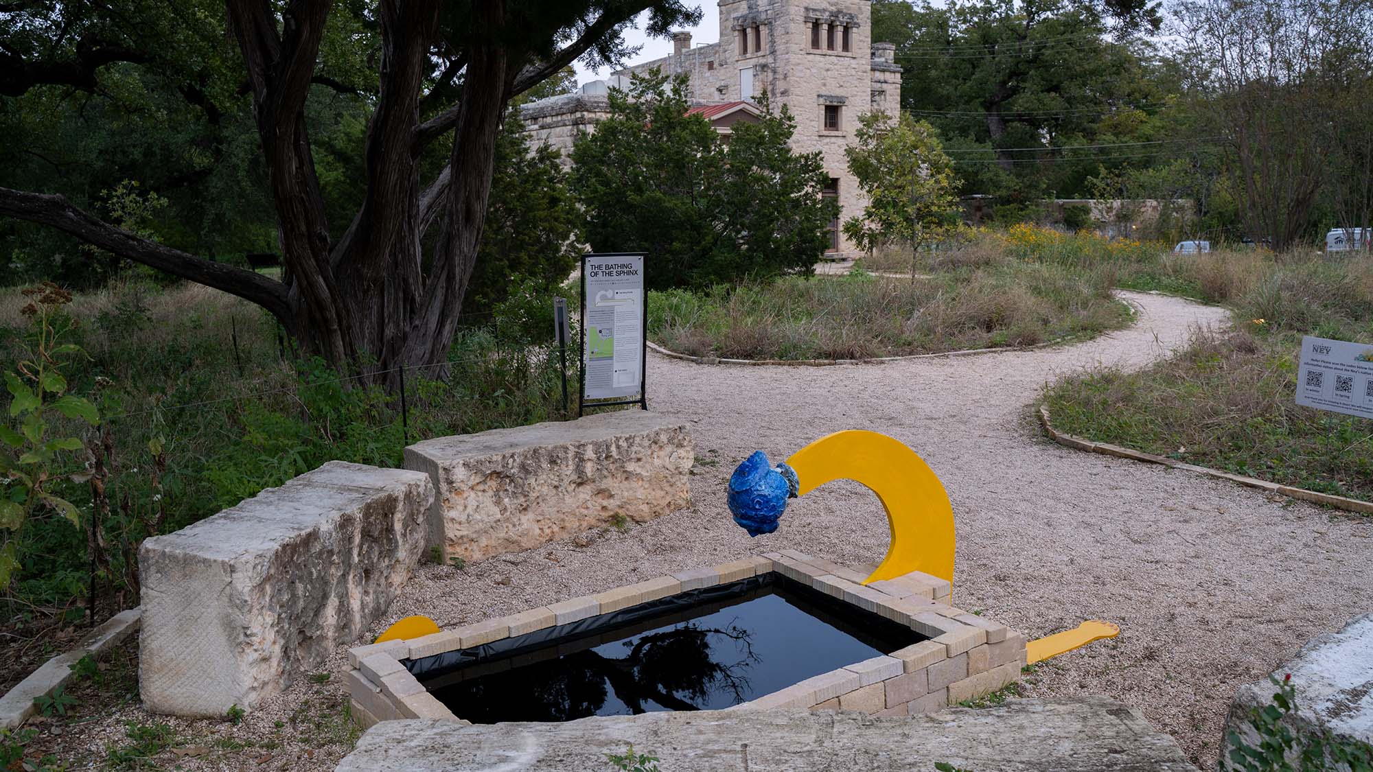 sculpture of shpinx/reflecting pool in the grounds of the Ney museum